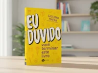 Capa do livro "Eu duvido você terminar este livro" em uma mesa de madeira clara.